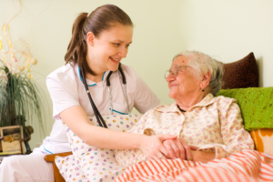caregiver and elderly woman
